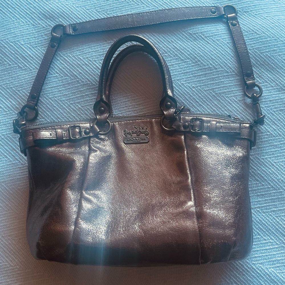 Coach metallic brownish colored bag with teal lining